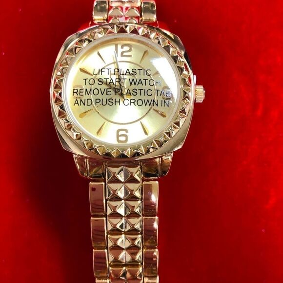 NEW WITH TAGS!! Wildlife gold-tone ladies wristwatch by Heidi Klum main image 4